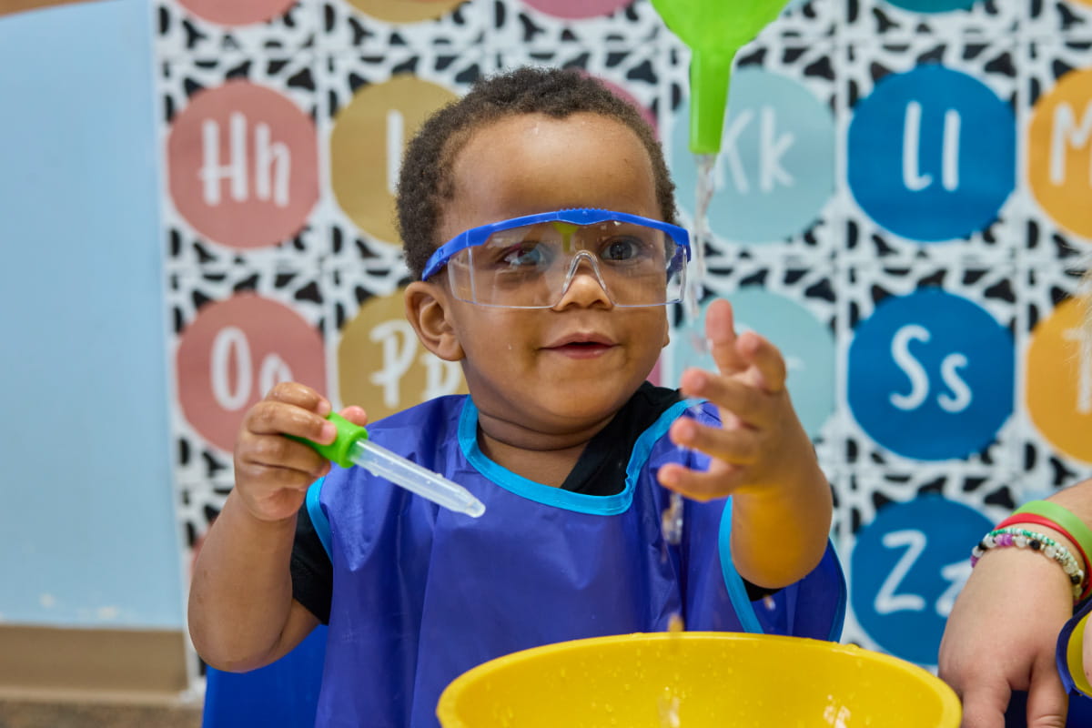 preschool kid doing science project