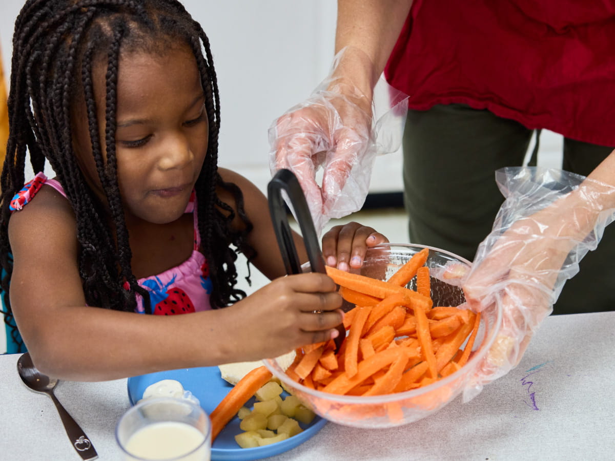kindergarten student at mealtime
