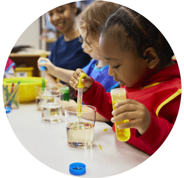 kids playing with STEM project